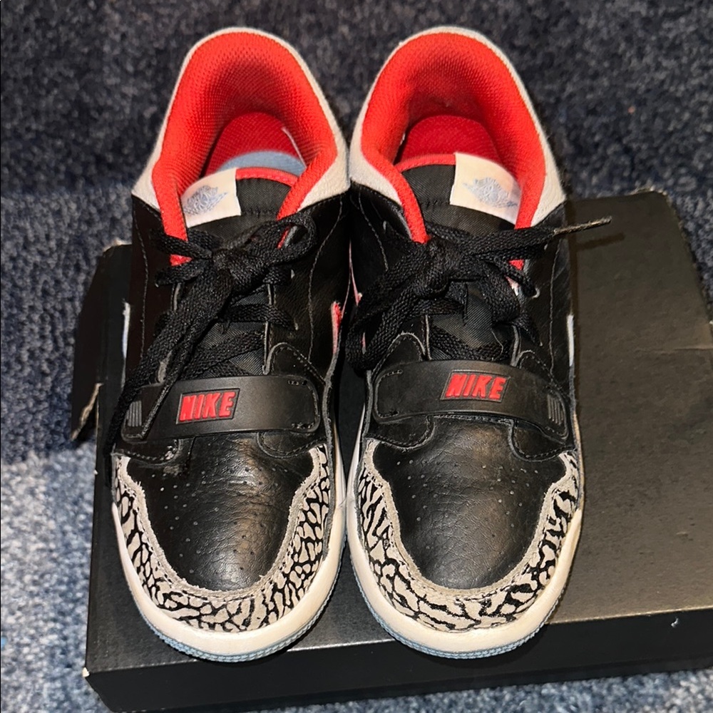 Nike Black and Red Sneakers with Animal Print Accents